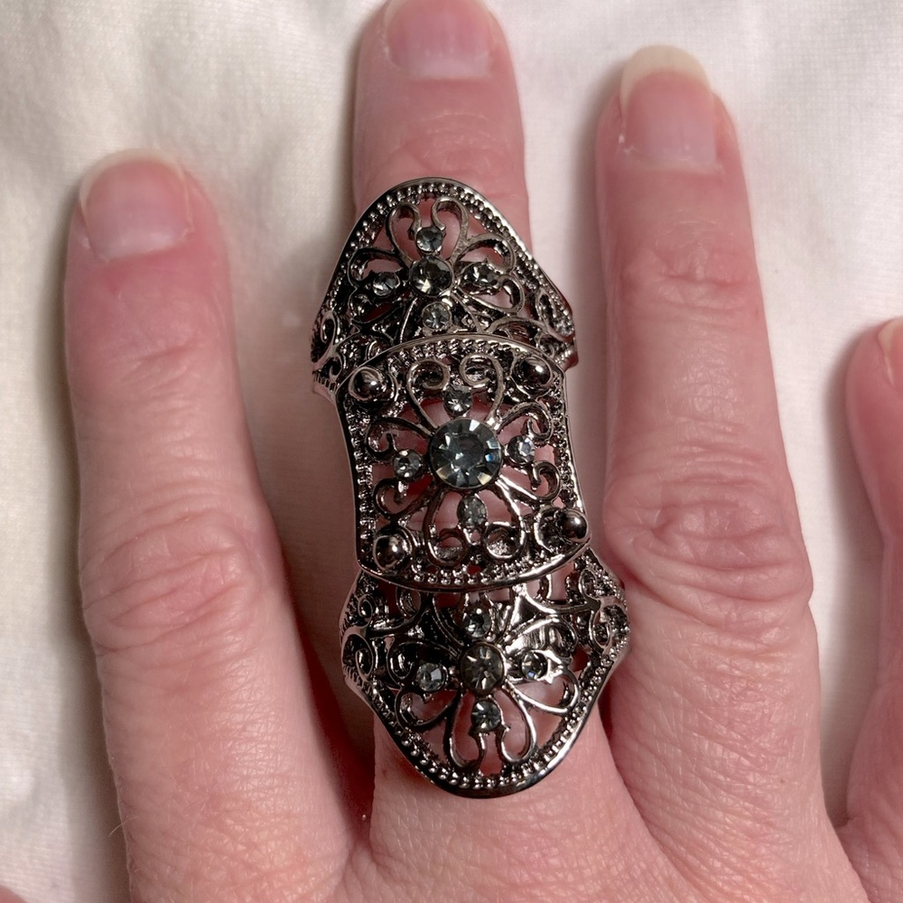 Black/Gunmetal Filigree knuckle ring w/green “peridot” stones (adjustable size)